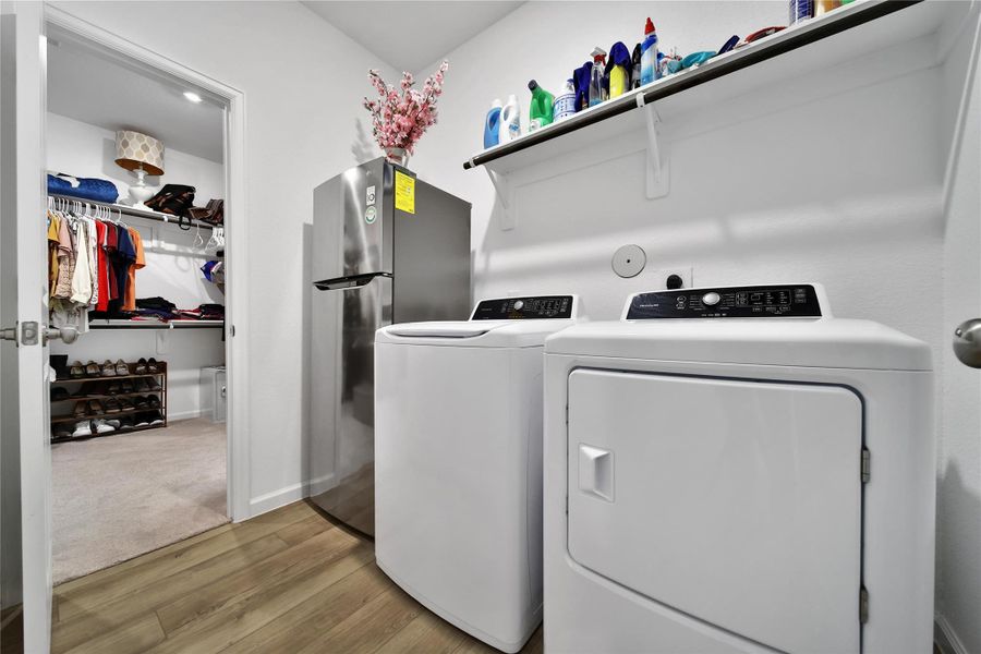 notice how the primary closet opens up into the laundry room! so convenient sooo smart!