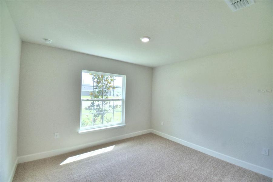 Spacious, unfurnished interior of a new home in Cadence Crossing, Auburndale (Image 33).