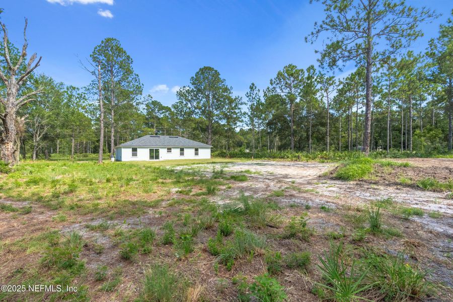 Front exterior of a new home in , Hastings, FL, highlighting curb appeal (Image 17). Front exterior of a new home in , Hastings, FL, highlighting curb appeal (Image 17).