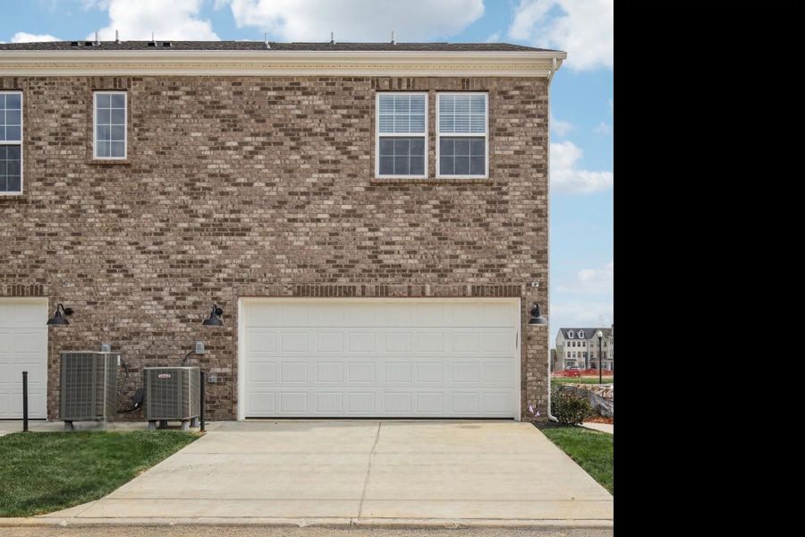 Front exterior of a new home in Promenade at Clari Park, Murfreesboro, TN, highlighting curb appeal (Image 22). Front exterior of a new home in Promenade at Clari Park, Murfreesboro, TN, highlighting curb appeal (Image 22).