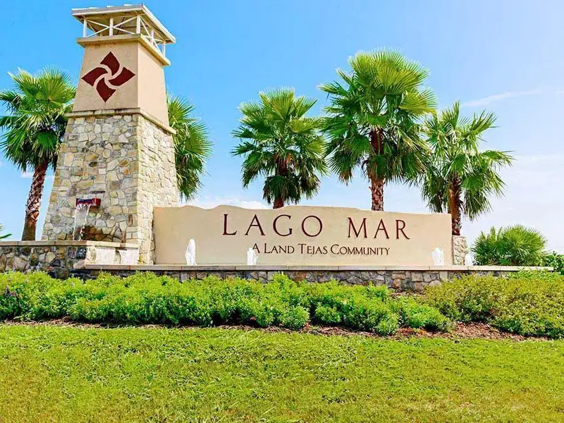 Entrance to the Lago Mar 40' at Lago Mar community in Texas City, TX, featuring signage and landscaping (Image 8). Entrance to the Lago Mar 40' at Lago Mar community in Texas City, TX, featuring signage and landscaping (Image 8).