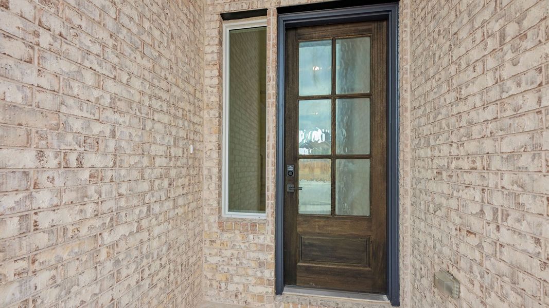Exterior details and patio area of a home in The Enclave at Bar W Ranch, Leander (Image 3).