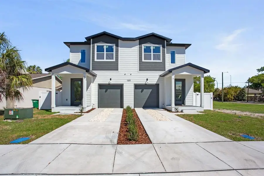 Front exterior of a new home in , Tampa, FL, highlighting curb appeal (Image 1). Front exterior of a new home in , Tampa, FL, highlighting curb appeal (Image 1).