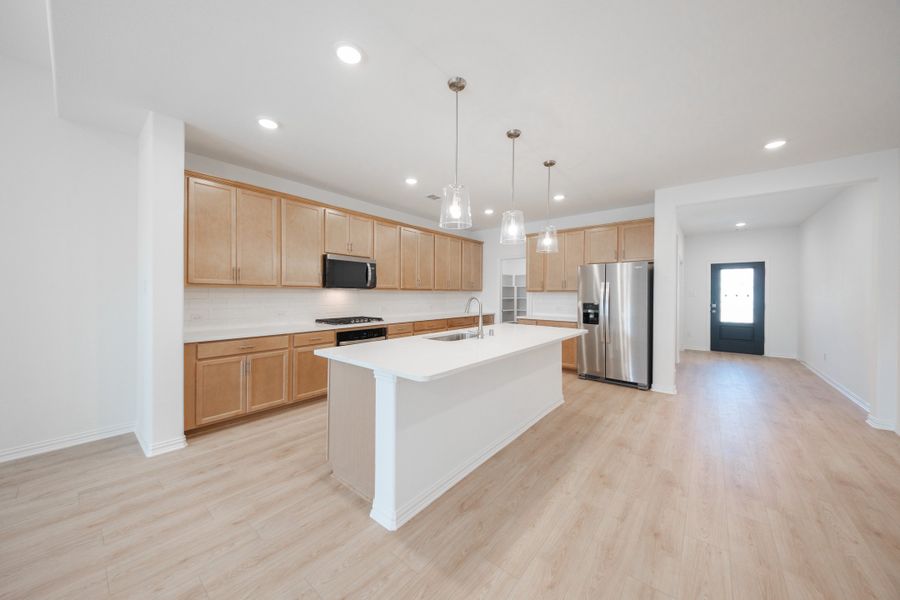 Furnished interior view inside a new home in The Villages of Hurricane Creek, Anna (Image 7).