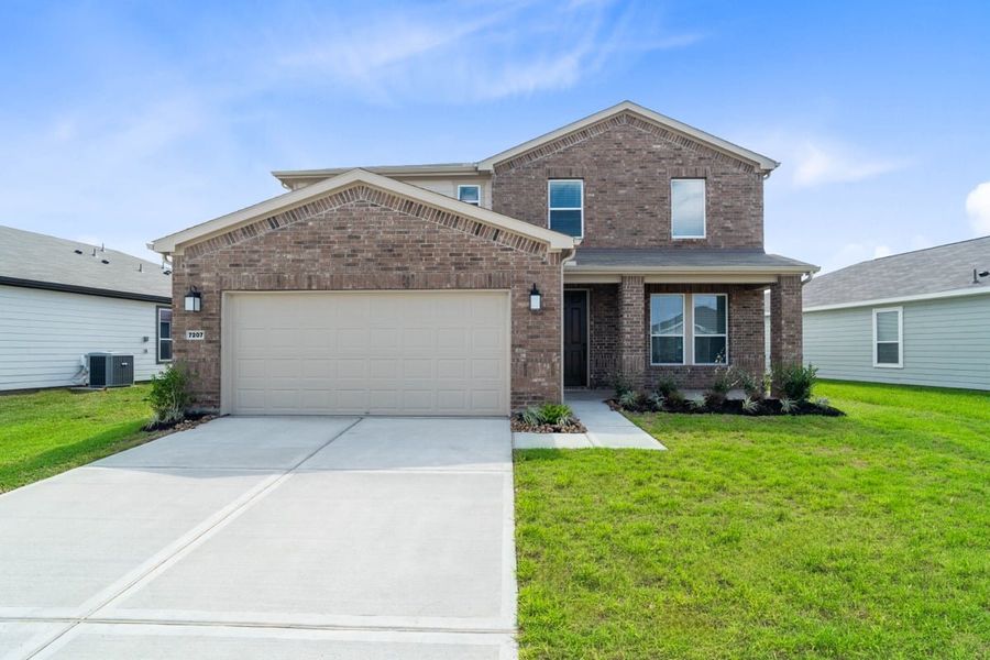 Front exterior of a new home in Saddlebrook Preserve, Beasley, TX, highlighting curb appeal (Image 1). Front exterior of a new home in Saddlebrook Preserve, Beasley, TX, highlighting curb appeal (Image 1).