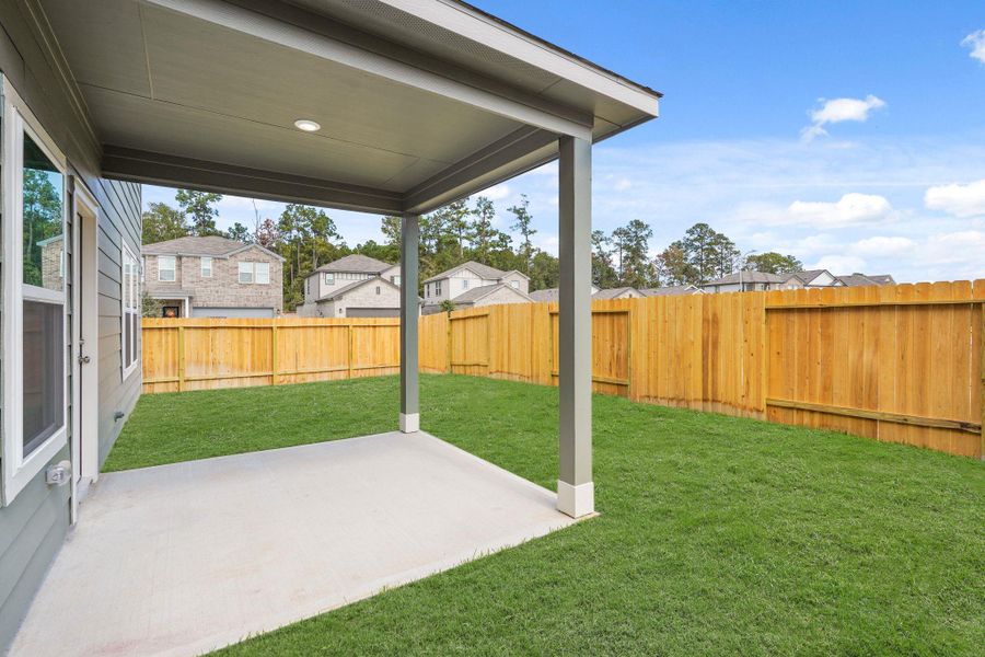 Exterior details and patio area of a home in Lakes at Black Oak, Magnolia (Image 3).