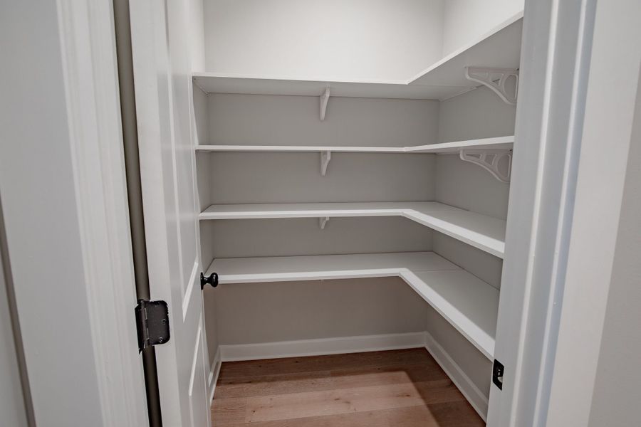 Representative unfurnished interior of a home built from the Willow by Grant & Co in Manor at Hall Creek, Arlington (Image 24).