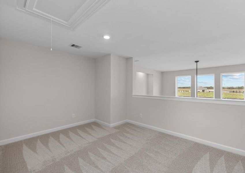 The upstairs game room is the perfect place for your kids to play.