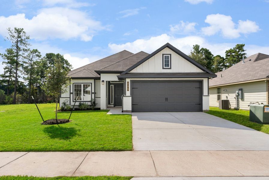 Front exterior of a new home in Sterling Ridge, Huntsville, TX, highlighting curb appeal (Image 1). Front exterior of a new home in Sterling Ridge, Huntsville, TX, highlighting curb appeal (Image 1).