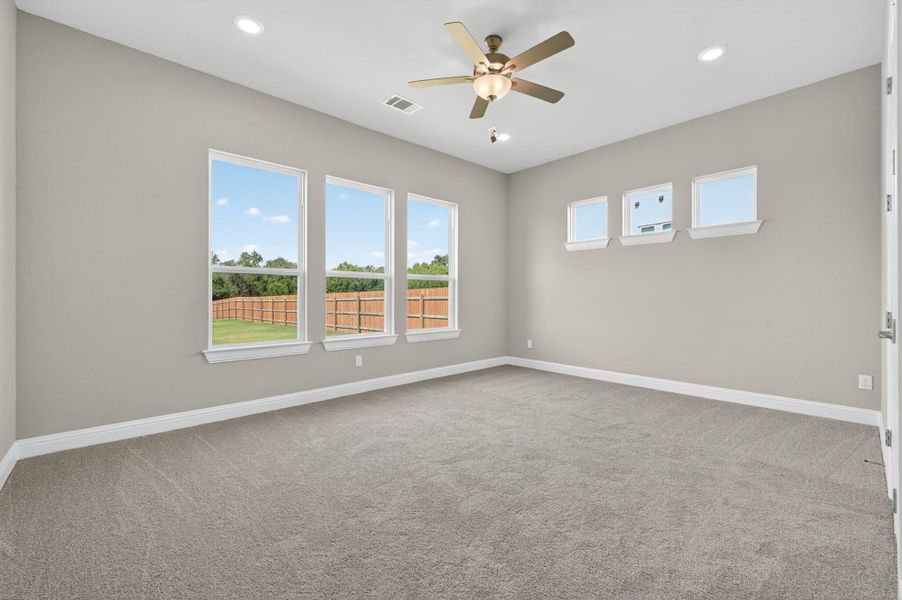 Unfurnished room with light colored carpet, recessed lighting, and a ceiling fan
