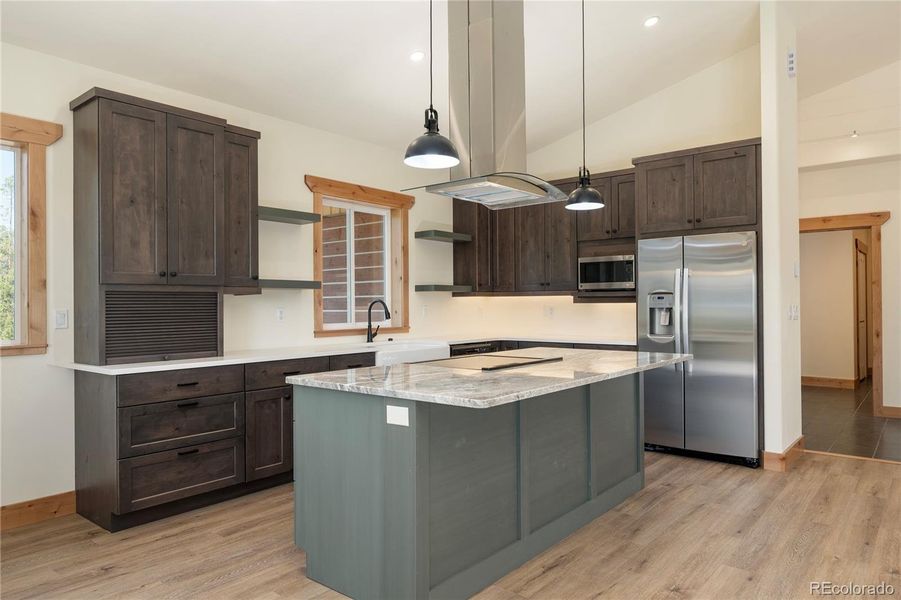 Modern kitchen with granite and quartz counter tops