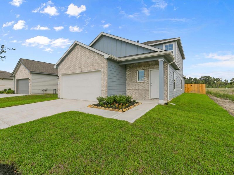 Front exterior of a new home in The Villages at WestPointe, Dayton, TX, highlighting curb appeal (Image 23).