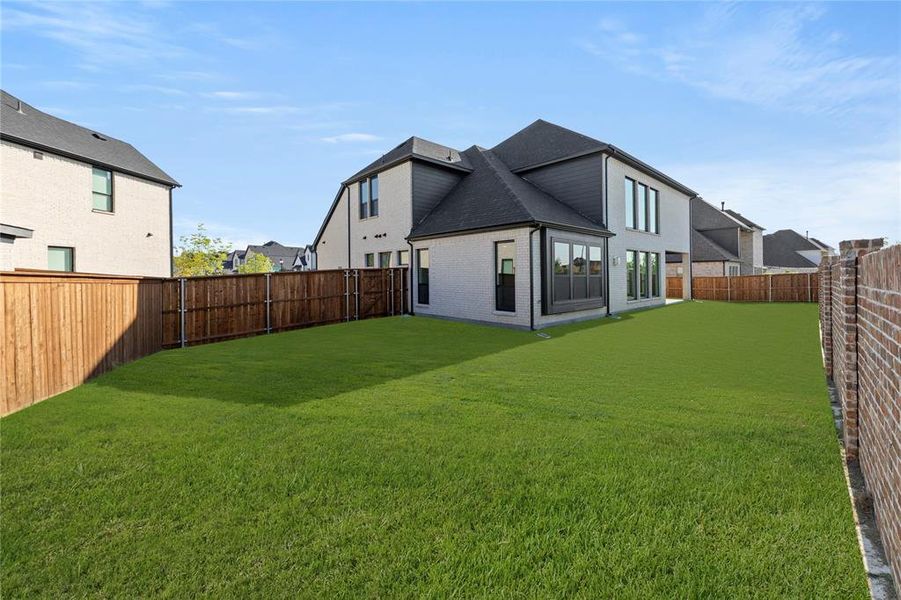 Exterior details and patio area of a home in Estates at Rockhill, Frisco (Image 3). Exterior details and patio area of a home in Estates at Rockhill, Frisco (Image 3).