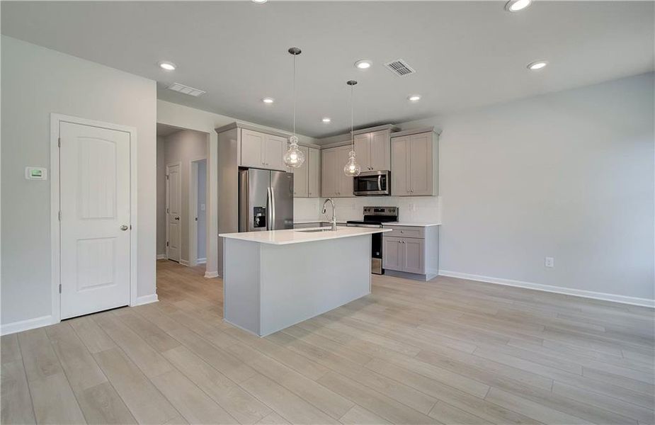 Furnished interior view inside a new home in Enclave at Evergreen, Fairburn (Image 6).