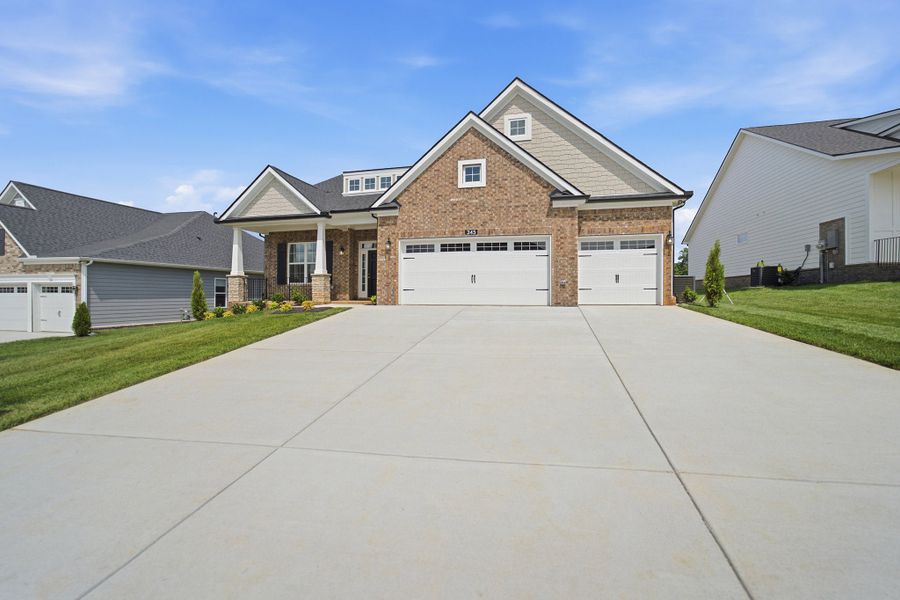 Front exterior of a new home in Dorris Farm, White House, TN, highlighting curb appeal (Image 2).