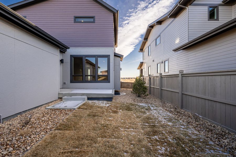 Exterior details and patio area of a home in West Grange, Longmont (Image 4).