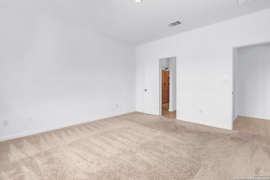 Spacious, unfurnished interior of a new home in Navarro Ranch: Classic Collection, Seguin (Image 23).