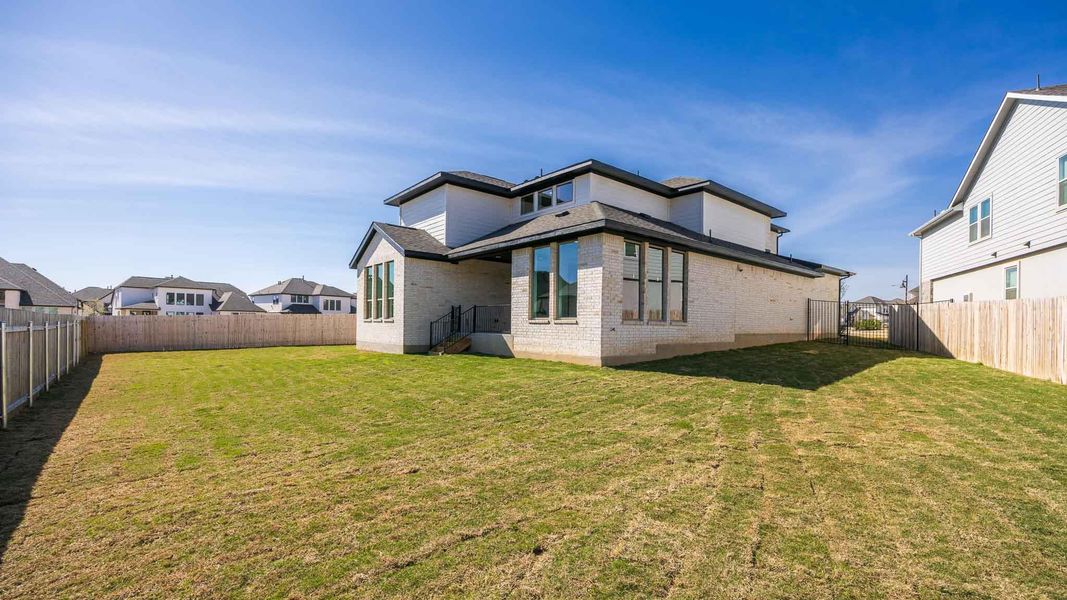 Exterior details and patio area of a home in Santa Rita Ranch Tierra Rosa, Liberty Hill (Image 3). Exterior details and patio area of a home in Santa Rita Ranch Tierra Rosa, Liberty Hill (Image 3).
