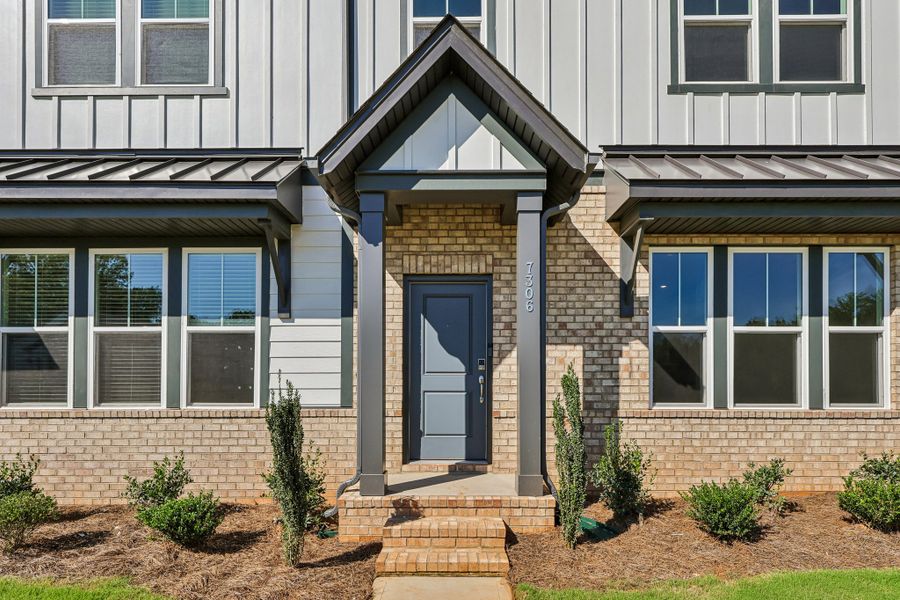 Exterior details and patio area of a home in Terraces at the Exchange, Fort Mill (Image 3).