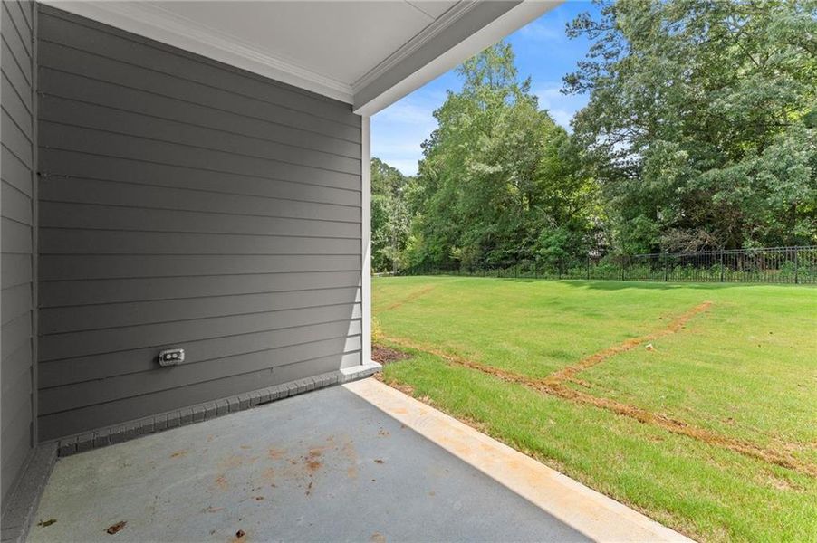 Exterior details and patio area of a home in Hillgrove Preserve, Powder Springs (Image 31).