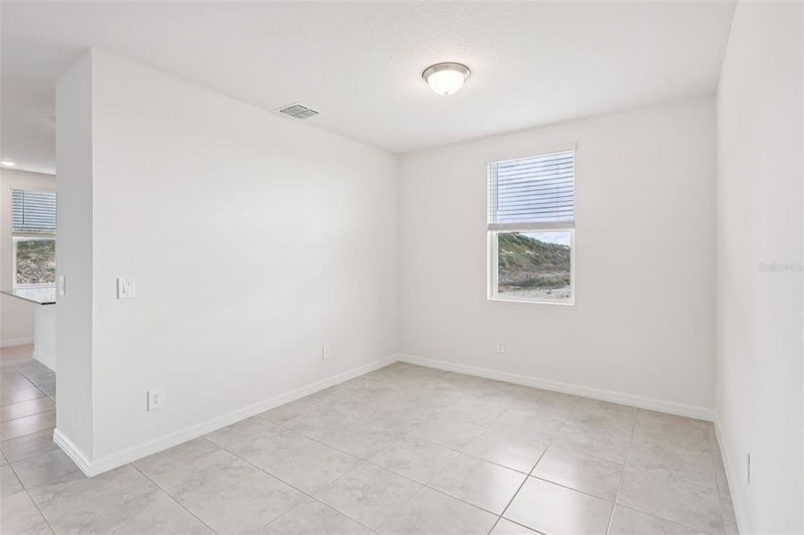 Spacious, unfurnished interior of a new home in Crosswinds - Signature Series, Haines City (Image 13).