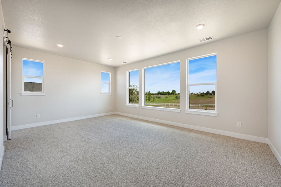 Spacious, unfurnished interior of a new home in Kitchel Lake at Serratoga Falls, Timnath (Image 12).