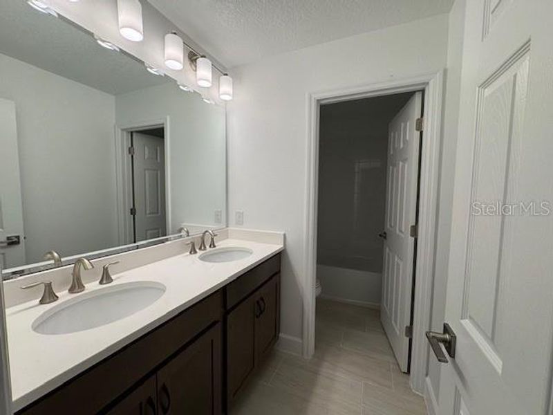 Furnished interior view inside a new home in Harrell Oaks, Orlando (Image 3).