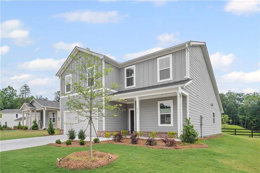 Front exterior of a new home in Avery Ridge, Gainesville, GA, highlighting curb appeal (Image 2).