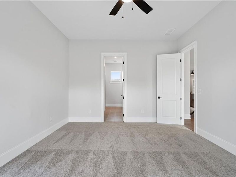 Spacious, unfurnished interior of a new home in The Village at Towne Lake, Woodstock (Image 69).
