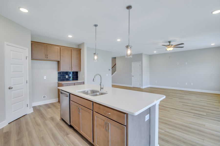 Seabrook Kitchen with Quartz Countertops and Tile Backsplash