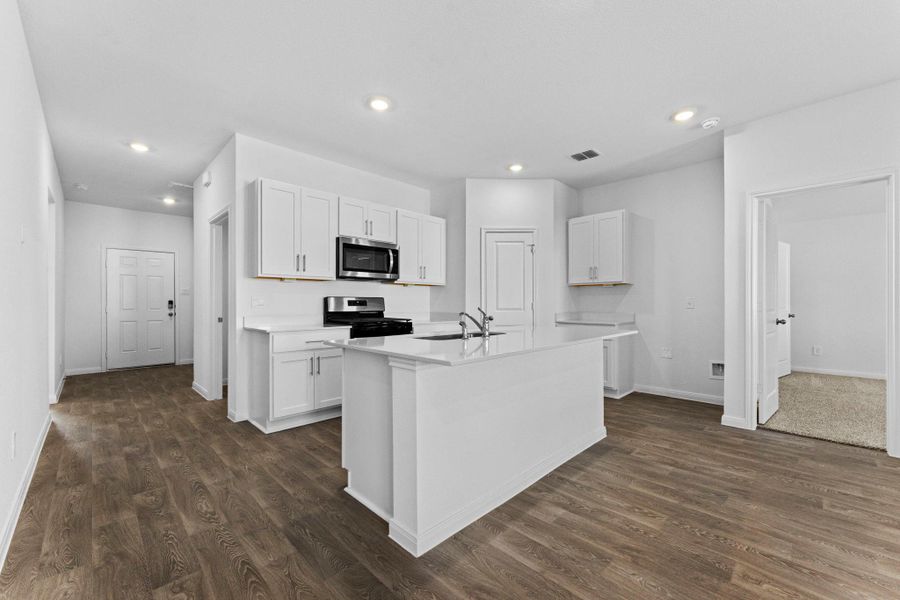 Furnished interior view inside a new home in Trace, San Marcos (Image 6).