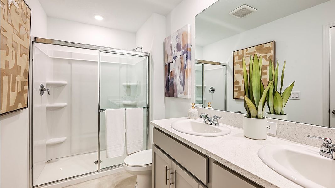 Furnished interior in a model home at Waterstone Townhomes in Groveland (Image 10).