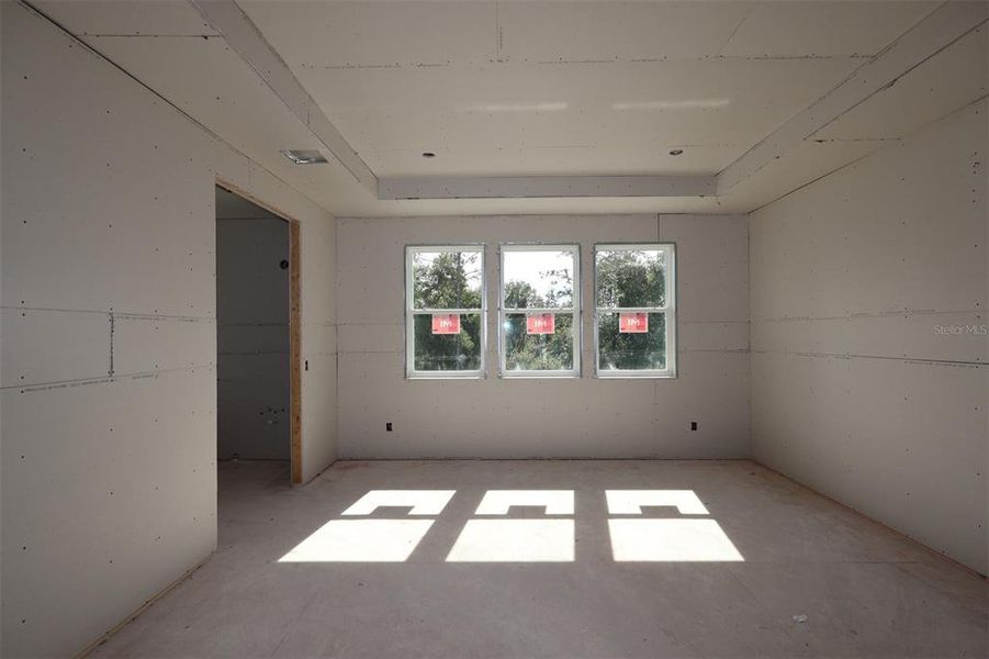 In-progress construction of a new home in Eden at Crossprairie, St. Cloud, FL (Image 22).