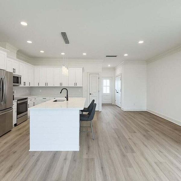 Furnished interior view inside a new home in , North Charleston (Image 6).