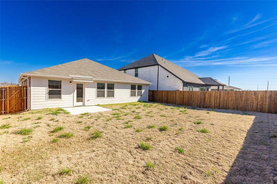 Front exterior of a new home in Stratton Place, Greenville, TX, highlighting curb appeal (Image 22).