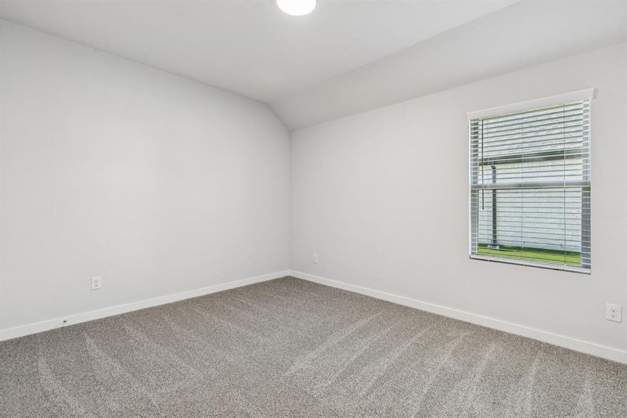 Bedroom in the Oscar home plan by Trophy Signature Homes – REPRESENTATIVE PHOTO