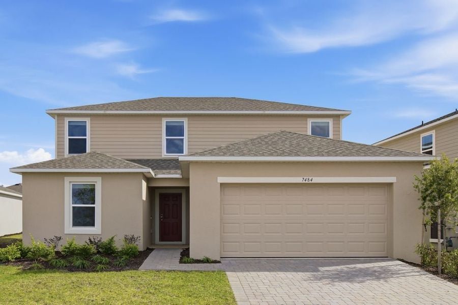 Representative exterior photo of a completed home built from the Cottonwood by Taylor Morrison in Waterstone, Groveland, FL (Image 2). Representative exterior photo of a completed home built from the Cottonwood by Taylor Morrison in Waterstone, Groveland, FL (Image 2).