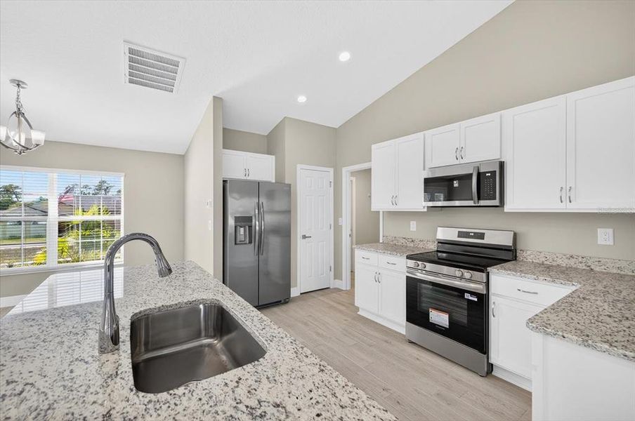 Furnished interior view inside a new home in , Weeki Wachee (Image 10).