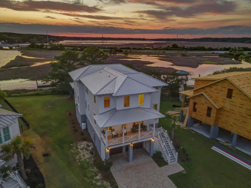 Exterior details and patio area of a home in , Johns Island (Image 33).