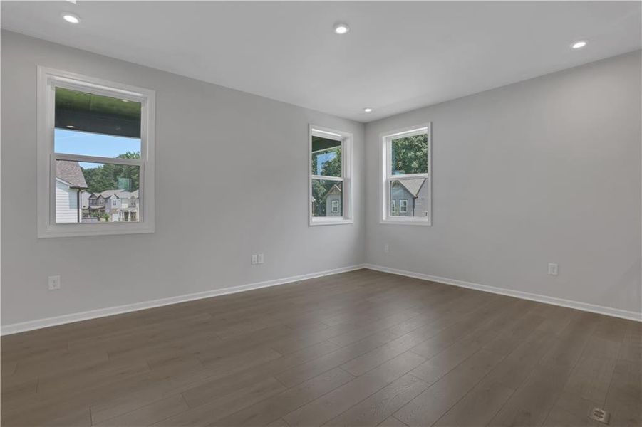 Spacious, unfurnished interior of a new home in The Paddocks at Doc Hughes, Buford (Image 30).