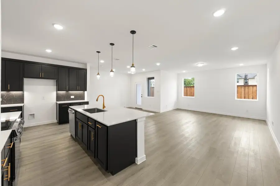 Open Kitchen-Living-Dining Room Representative Photo featuring the Noir Collection Open Kitchen-Living-Dining Room Representative Photo featuring the Noir Collection