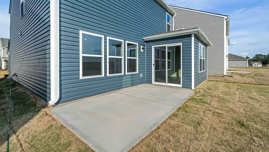 Exterior details and patio area of a home in Harper Ridge, Roebuck (Image 3).