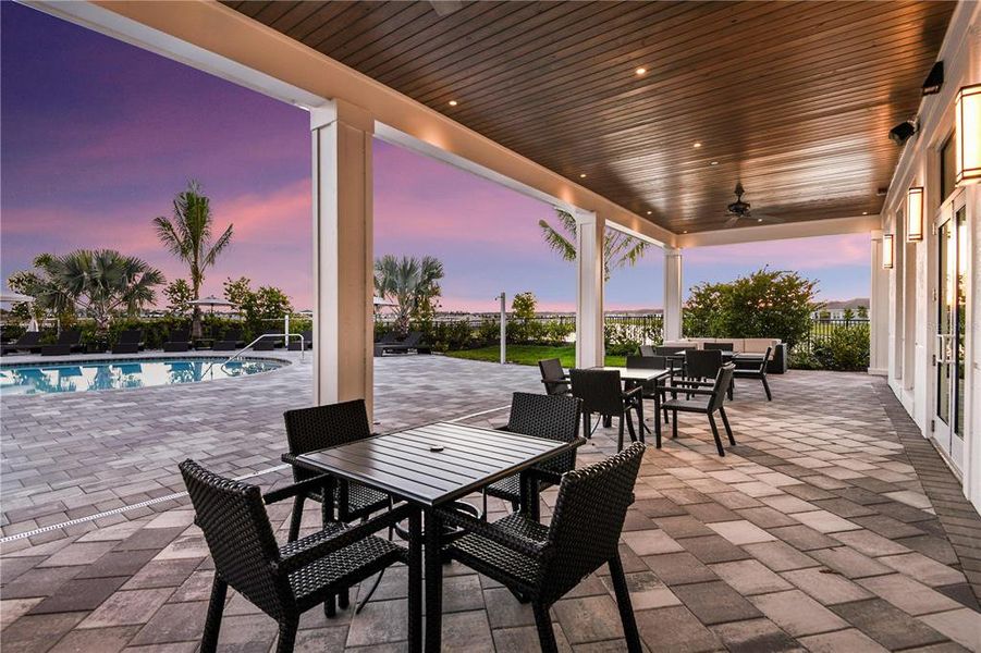 Exterior details and patio area of a home in The Cove at West Port, Port Charlotte (Image 21).