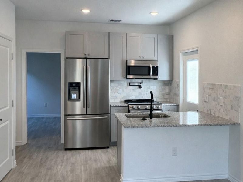 Furnished interior view inside a new home in Lake Conroe Village, Montgomery (Image 3). Furnished interior view inside a new home in Lake Conroe Village, Montgomery (Image 3).