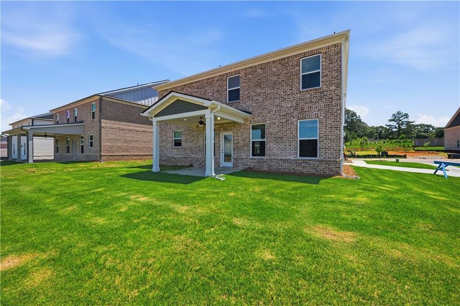 Exterior details and patio area of a home in Bowers Farm, McDonough (Image 19).