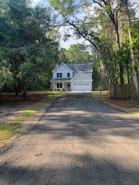 Front exterior of a new home in , Charleston, SC, highlighting curb appeal (Image 20).