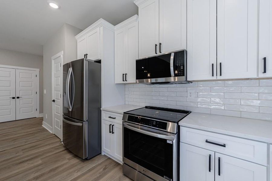 Furnished interior view inside a new home in , Carrollton (Image 8).