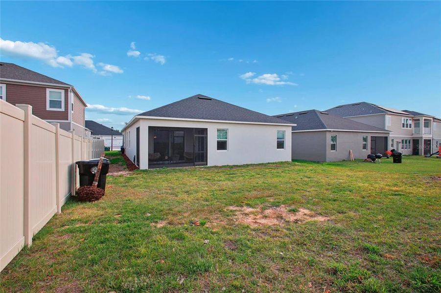 Exterior details and patio area of a home in Emerson Pointe, Apopka (Image 4). Exterior details and patio area of a home in Emerson Pointe, Apopka (Image 4).