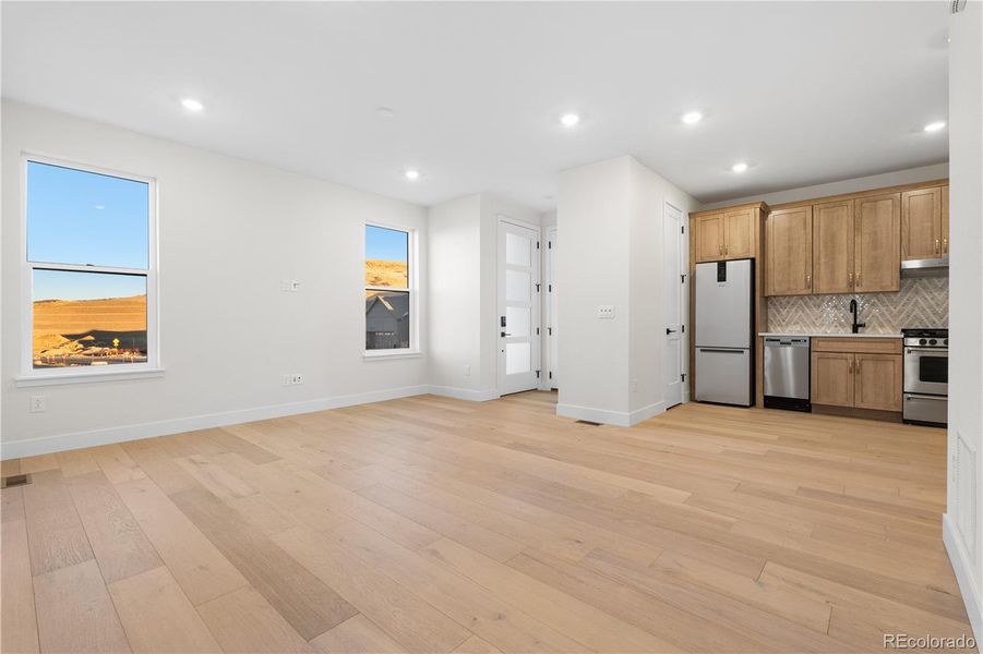 Spacious, unfurnished interior of a new home in Autograph at Lyric, Lone Tree (Image 45).