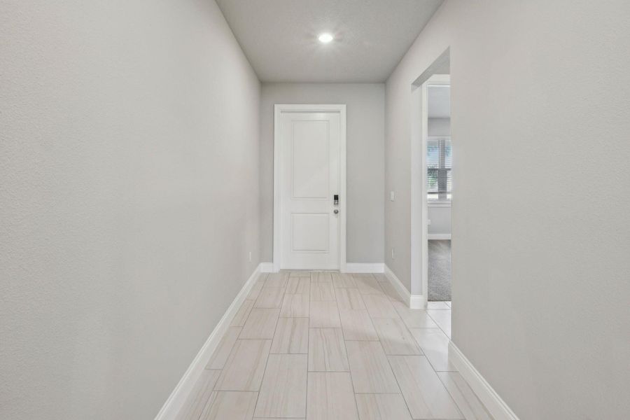 Spacious, unfurnished interior of a new home in Brystol at Wylder - Reserve Series, Port St. Lucie (Image 14).